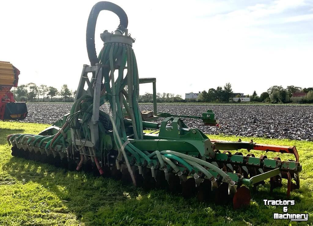 Disc harrow  Schijveneg met bemester