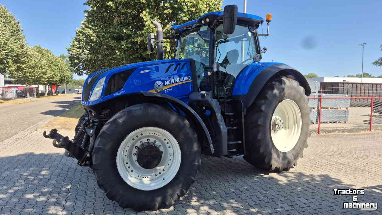 Tractor New Holland T7.315 HD AC 40Kmh. Lucht, Fronthef, geveerde vooras en cabine.