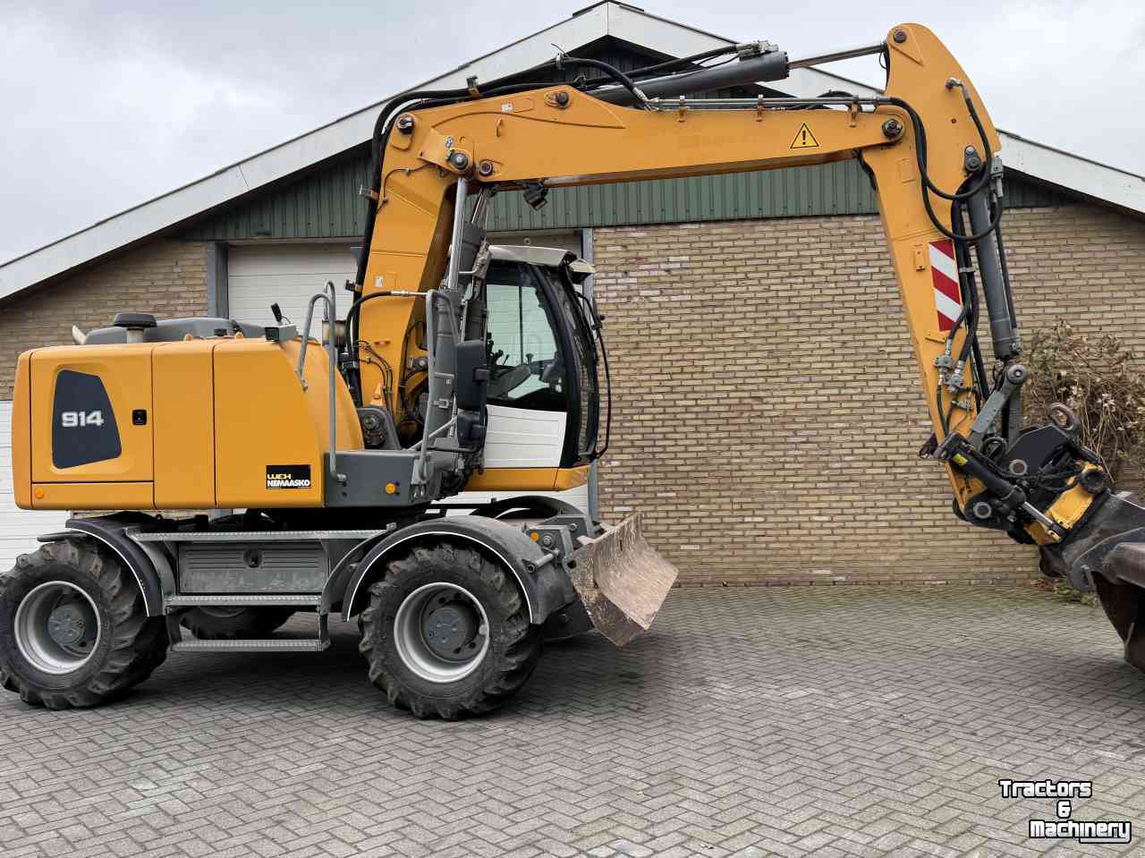 Excavator Liebherr A914 met Engcon draaikantelstuk