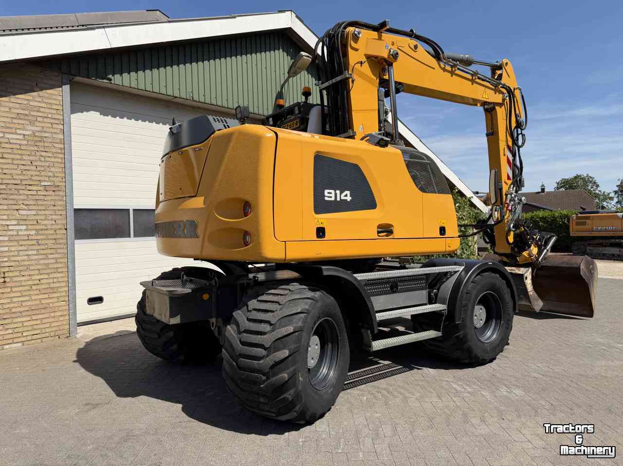 Excavator mobile Liebherr A914 met Draaikantelstuk