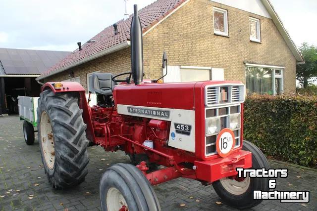 Tractor International met handkoppeling voor aftakas