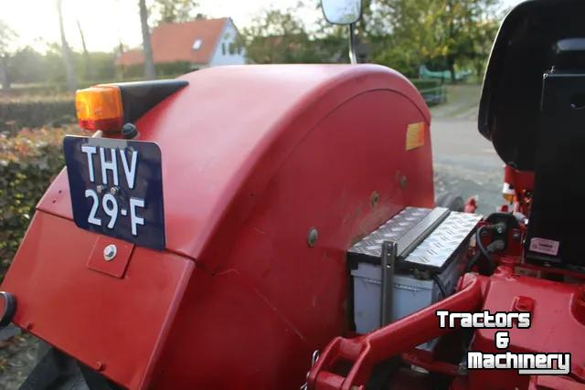 Tractor International met handkoppeling voor aftakas