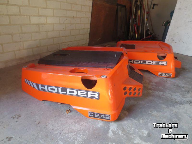 Diverse new spare-parts Holder C    2.42