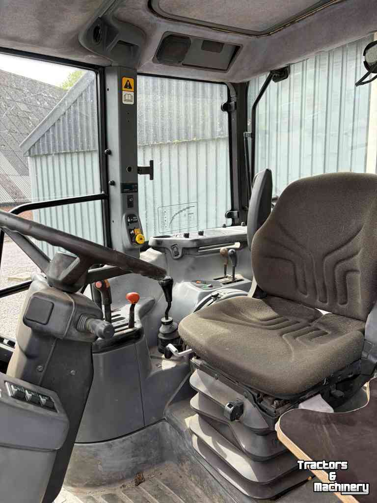 Tractor New Holland TS100 met kruipbak