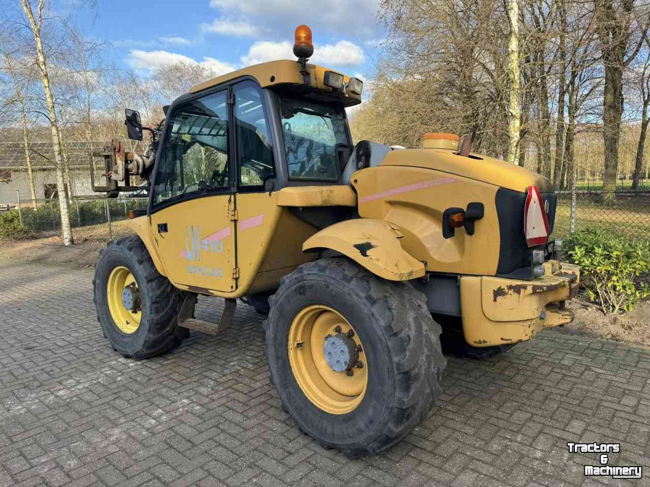 Telehandler New Holland LM410 Verreiker shovel