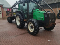 Tree transporter Valtra 6550 + MOHEDA UITRIJWAGEN