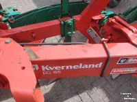 Ploughs Kverneland EG 85 4 schaar ploeg met Packomat vorenpakker