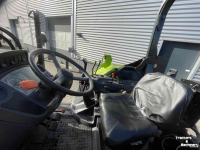 Tractor Claas Axos 340 tractor met Stoll voorlader