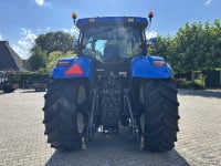 Tractor New Holland T7030 PowerCommand. Fronthef, Vooras vering, 40km.