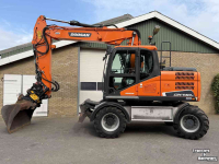 Excavator Doosan DX140w-5 met draaikantelstuk egcon