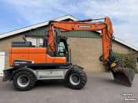 Excavator Doosan DX140w-5 met draaikantelstuk egcon