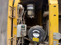 Excavator mobile Komatsu PW180-10