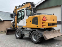 Excavator Liebherr A914 met Engcon draaikantelstuk