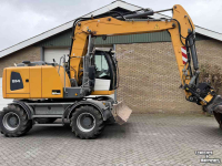 Excavator Liebherr A914 met Engcon draaikantelstuk