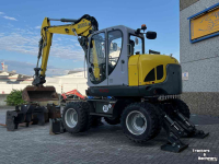 Excavator mobile Wacker Neuson EW 100 Airco Powertilt 3 Bakken Palletvork  Steunpoten