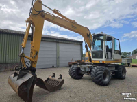 Excavator mobile Liebherr 312 banden kraan graafmachine