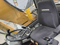 Excavator mobile Liebherr 312 banden kraan graafmachine