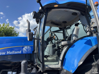 Tractor New Holland T7030 PowerCommand. Fronthef, Vooras vering, 40km.