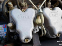 Vibrating rollers Caterpillar CB-114 Trilwals
