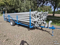 Irrigation pipes  Kar met 64 dikke aanvoer buizen