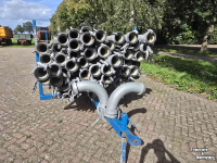 Irrigation pipes  Kar met 64 dikke aanvoer buizen