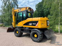 Excavator mobile Caterpillar m313d Mobiele kraan
