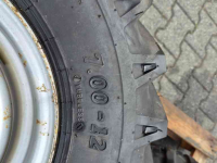 Wheels, Tyres, Rims & Dual spacers BKT 4x BKT 7.00-12 met velg