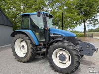 Tractor New Holland TS100 met kruipbak
