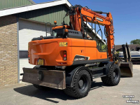 Excavator mobile Doosan DX140w-5 met draaikantelstuk