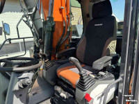 Excavator mobile Doosan DX140w-5 met draaikantelstuk
