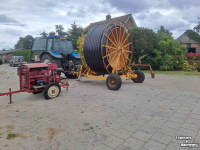 Stationary engine/pump set Emergo Haspel met Nelson sproeier en MwM motorpomp